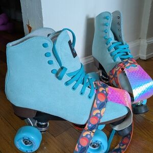 Teal Sure Grip Boardwalk Roller Skates with Colorful Straps